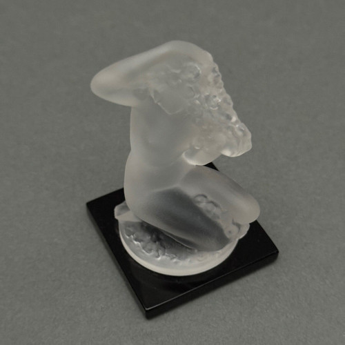 Nude female subject by Lalique in frosted glass on black base