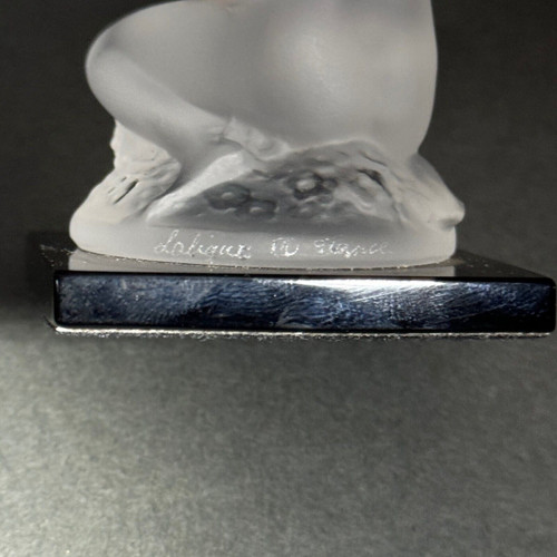 Nude female subject by Lalique in frosted glass on black base