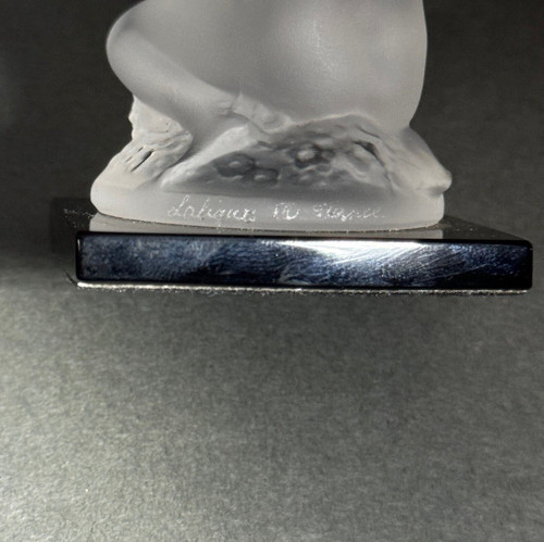 Nude female subject by Lalique in frosted glass on black base