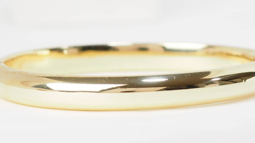 Bracciale bangle traforato in oro giallo