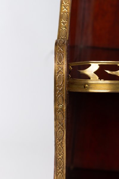 Louis XVI style mahogany corner with bronze and gilt brass decoration circa 1890-1900