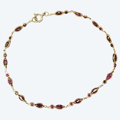 Bracelet set with 30 rubies, 18-carat gold.