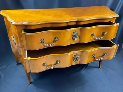 Large Louis XV-style bronze cherrywood commode with crossbow profile