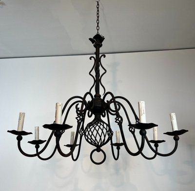 Important 8-Arm Wrought Iron Chandelier. French work. Circa 1940