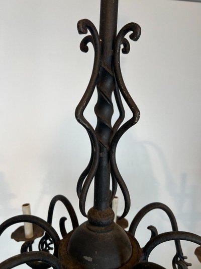 Important 8-Arm Wrought Iron Chandelier. French work. Circa 1940