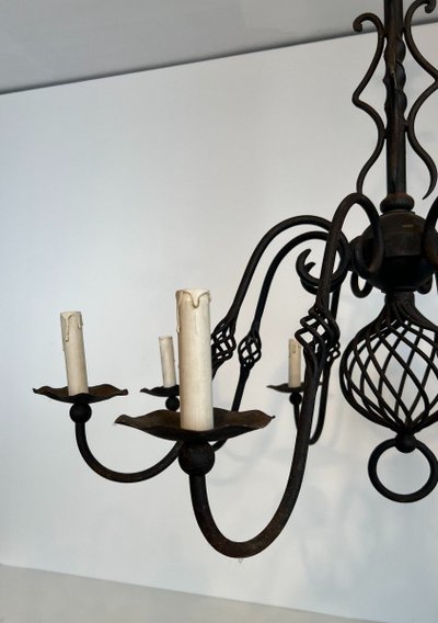 Important 8-Arm Wrought Iron Chandelier. French work. Circa 1940