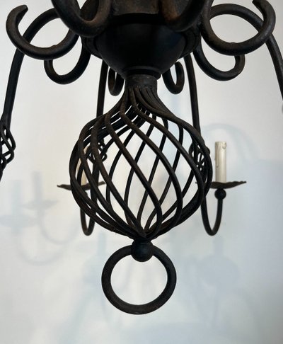 Important 8-Arm Wrought Iron Chandelier. French work. Circa 1940