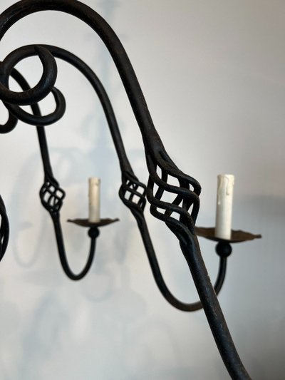 Important 8-Arm Wrought Iron Chandelier. French work. Circa 1940