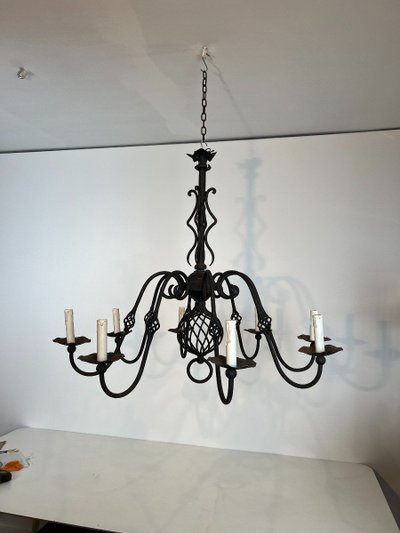 Important 8-Arm Wrought Iron Chandelier. French work. Circa 1940