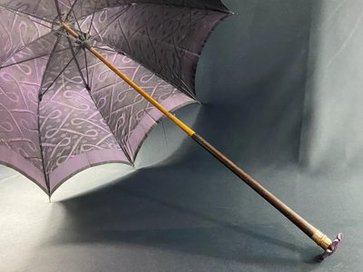 Large late 19th century parasol with carved mauve stone knob and possible gold ring