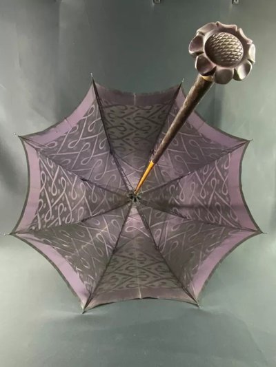 Large late 19th century parasol with carved mauve stone knob and possible gold ring