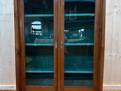 Empire style bookcase/display cabinet in cherry wood.