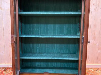 Empire style bookcase/display cabinet in cherry wood.