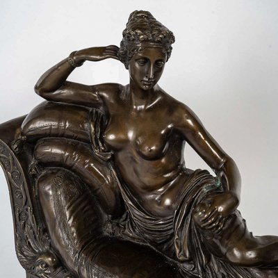 After Antonio Canova (1757-1822) - Pauline Borghese dite Venus Vitrix in bronze and marble circa 186