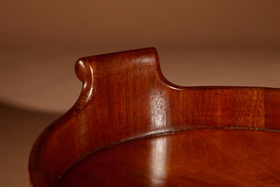 Unusual oval top in inlaid mahogany and satinwood.