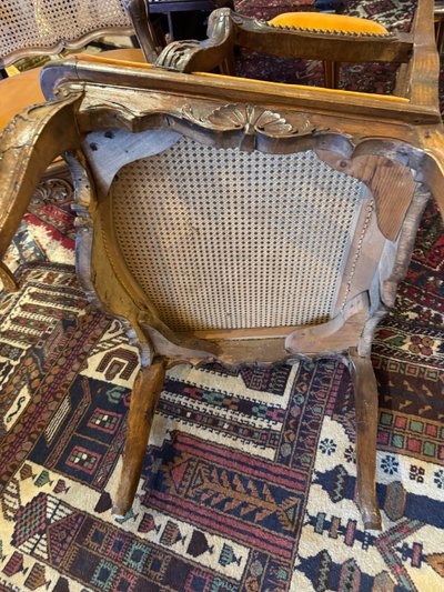 Pair of Louis XV cane armchairs in walnut