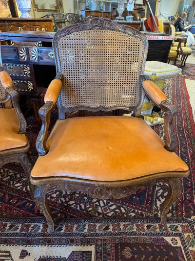 Pair of Louis XV cane armchairs in walnut