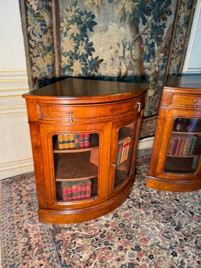 Pair of 19th century glass corner cabinets in blond oak