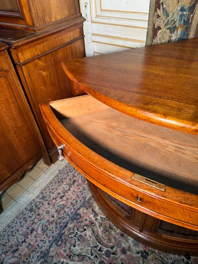 Pair of 19th century glass corner cabinets in blond oak