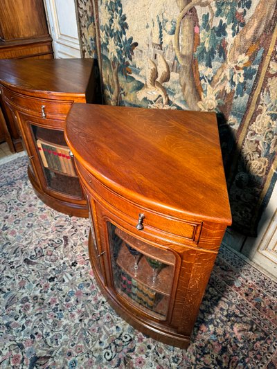 Pair of 19th century glass corner cabinets in blond oak