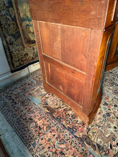 Pair of 19th century glass corner cabinets in blond oak