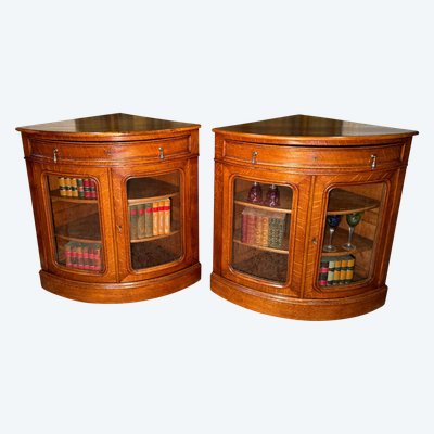 Pair of 19th century glass corner cabinets in blond oak