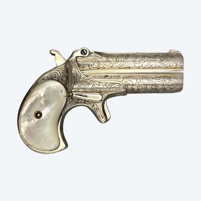 Remington Over and Under pistol, factory engraved, nickel-plated, mother-of-pearl plates 19th century USA