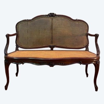 Louis XV mahogany and cane bench