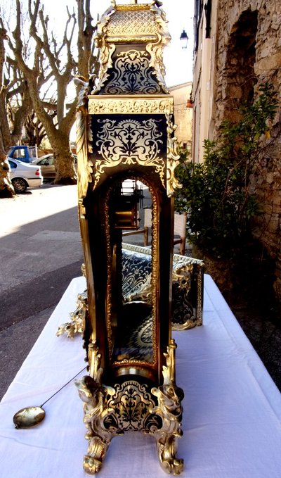 Cartel "aux Têtes enturbannées" in Boulle marquetry and its console, 140 cm