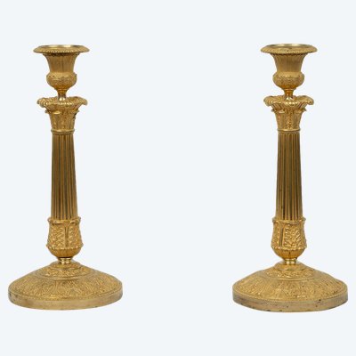 Pair of antique Empire ormolu candlesticks. 19th century.