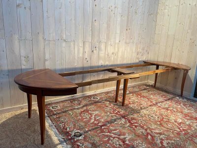 Round cherry wood dining table