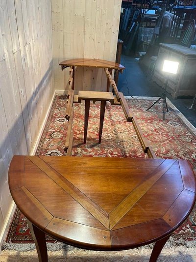 Round cherry wood dining table