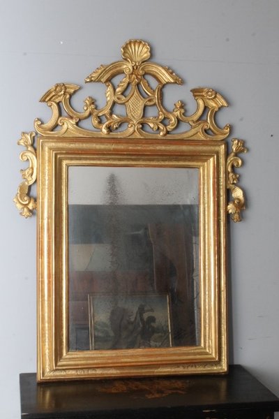 Antique mirror mid 1700s XVIII SEC . Pure gold . with beautiful cymatium. Meas 135 x cm 95