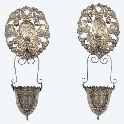 Pair of antique chased silver holy water fonts. Rome, 19th century.