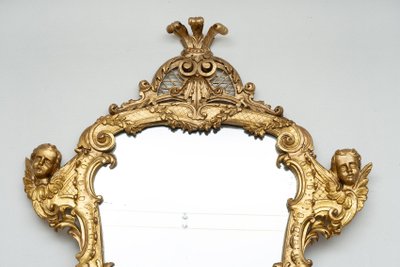 Antique giltwood and carved mirror. 18th century Rome.