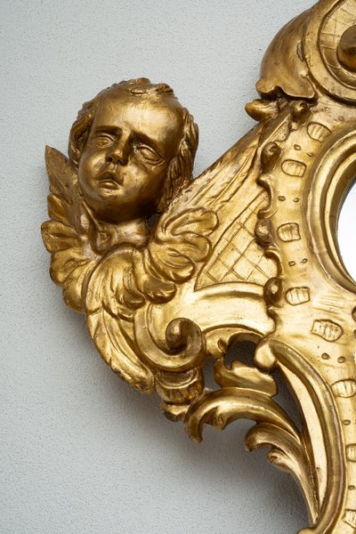 Antique giltwood and carved mirror. 18th century Rome.