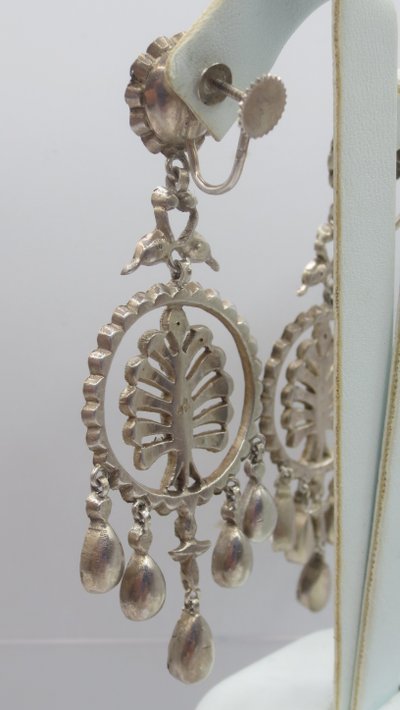 Girandole earrings.