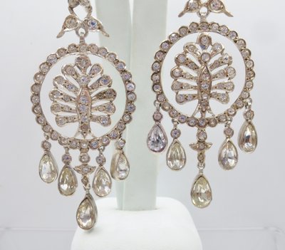 Girandole earrings.