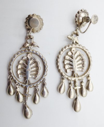 Girandole earrings.