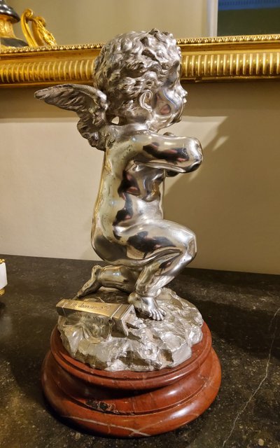 Silver bronze sculpture "Cupid" by Louis Kley, 19th century Marble base