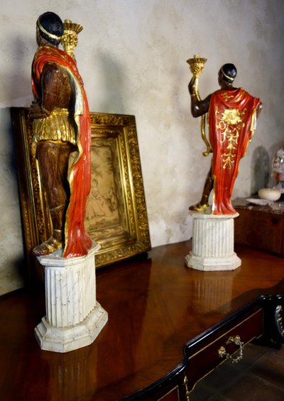 Pair of polychrome wooden torch holders