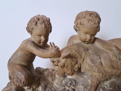 Joseph d'Asté, Gruppo di bambini e fauna che giocano con una capra, Terracotta, Firmato, XIX secolo.