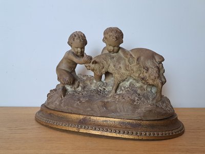 Joseph d'Asté, Gruppo di bambini e fauna che giocano con una capra, Terracotta, Firmato, XIX secolo.