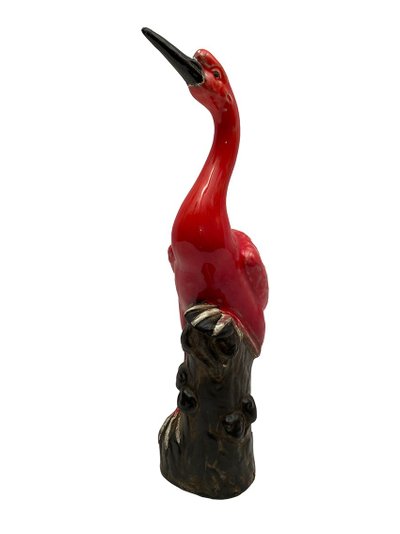 China, early 20th century, wading bird on its rock in enameled ceramic