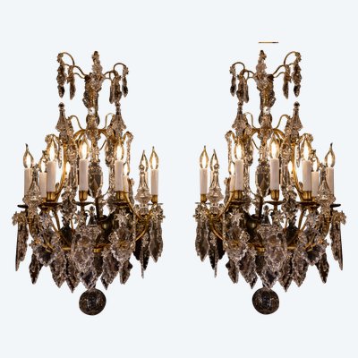 Signed by Cristalleries de Baccarat pair of Louis XV style gilt bronze and cut crystal chandeliers c