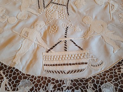 Embroidered pedestal tablecloth on the theme of grape harvests and wine, circa 1900