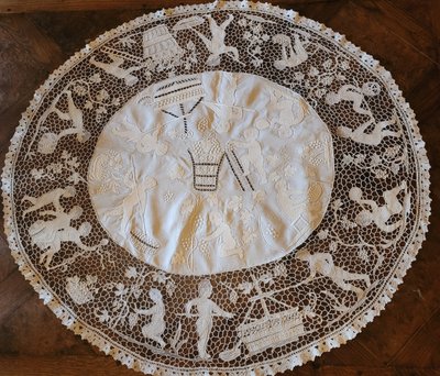 Embroidered pedestal tablecloth on the theme of grape harvests and wine, circa 1900