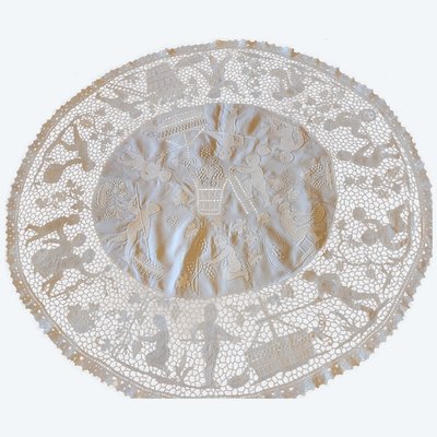 Embroidered pedestal tablecloth on the theme of grape harvests and wine, circa 1900