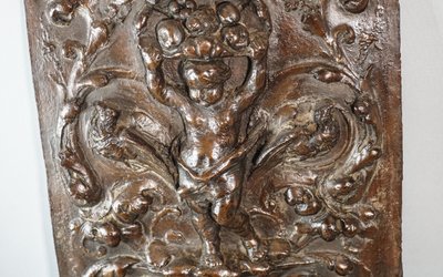 PUTTO, Bas relief on copper on wood, 19th century