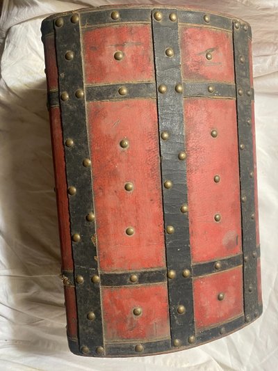 19th century red lacquered domed studded and strapped table box